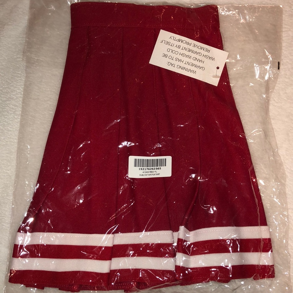Red pleated cheer skirt